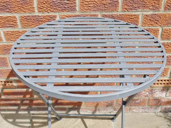 Industrial Grey Round Metal Garden Table - Close up of the top of the table