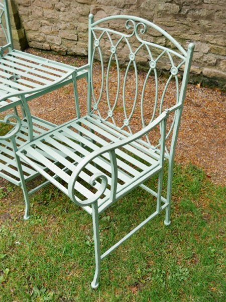Pistachio Green Lovers Metal Garden Bench - Close up image showing one of the chairs and part of the central table on the Lovers bench