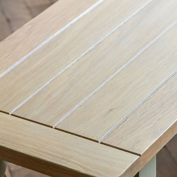 Harvest Direct Harrow Contemporary Prairie Painted / Oak Dining Bench - Close up image of the grooved planked top of the bench