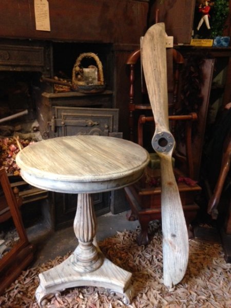 Reclaimed Pine Wine Table & Reclaimed Pine Propellor on display in our furniture showrooms