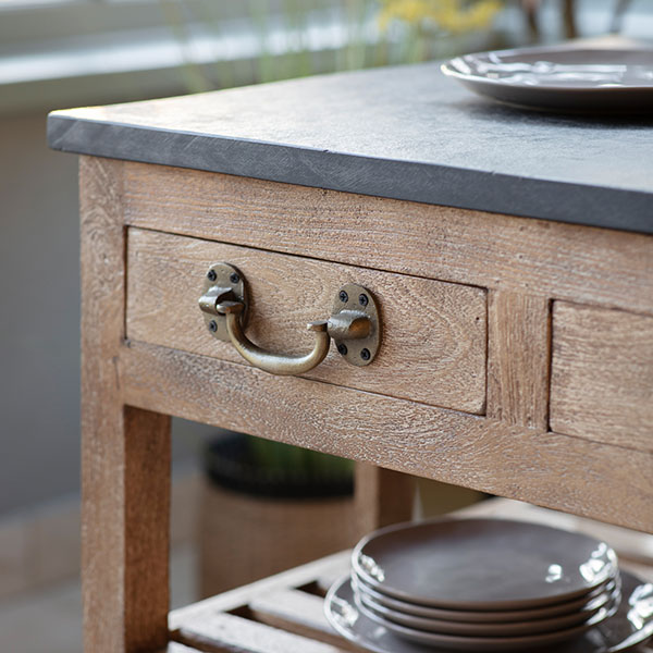 Gallery Direct Chigwell Kitchen Island - - Close up showing the black marble top, brass drawer handle & seasoned oak finish