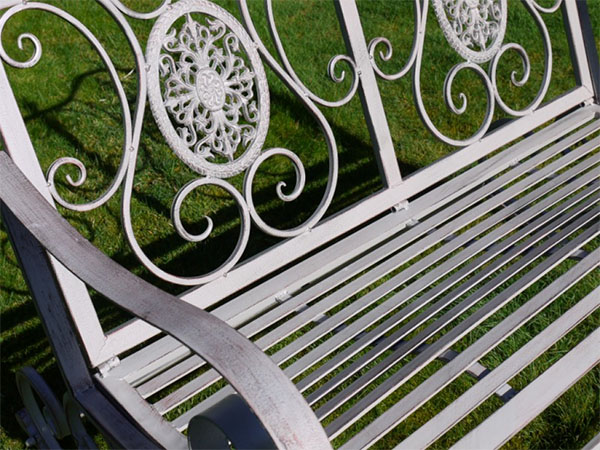 Antique Grey Metal Swirl Garden Rocking Bench - Close up image