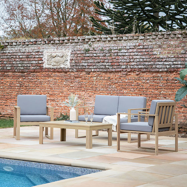 Gallery Direct Bourlac Natural Outdoor Lounge Set - Shown here in a garden poolside setting