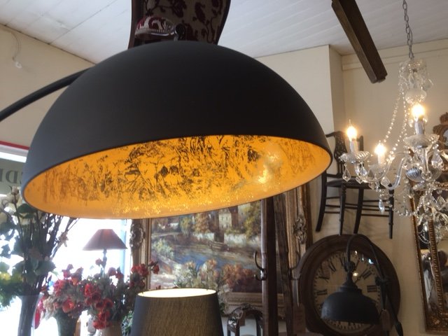 Image shows the lampshade on the sand / black finish curved floor standing lamp on display in our showrooms so you can see the sand finish