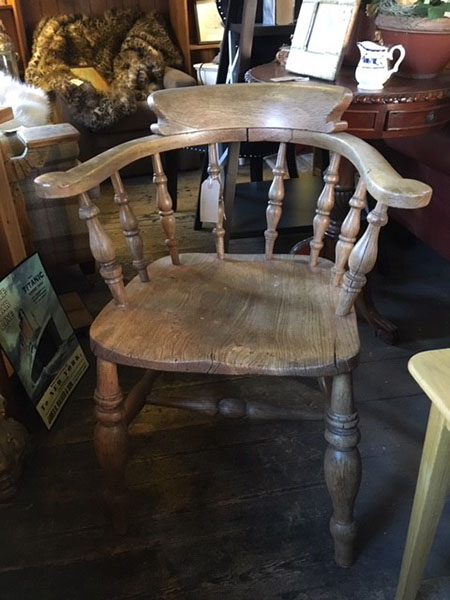 Ex-Display Antique Pine Captain's Chair on display in our showrooms