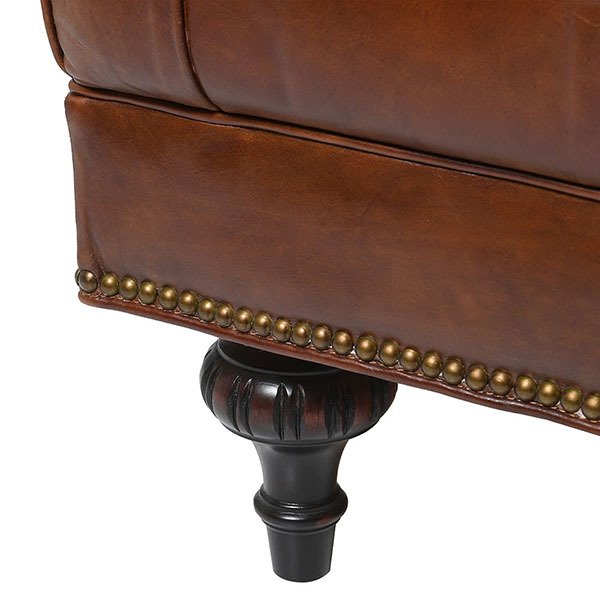 Vintage Brown Leather Rembrandt Chesterfield Sofa - Close up of the studded detailing and a leg