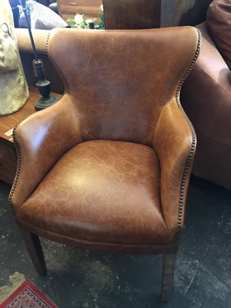 Classic Vintage Brown Leather Cottage Armchair on display in our Southport furniture showrooms